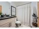 Clean bathroom with dark countertop and shower/tub combo at 426 Marietta Nw St # 410, Atlanta, GA 30313