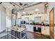 Modern kitchen with white cabinets, stainless steel appliances, and an island at 426 Marietta Nw St # 410, Atlanta, GA 30313