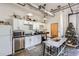 Modern kitchen with white cabinets, stainless steel appliances, and an island at 426 Marietta Nw St # 410, Atlanta, GA 30313