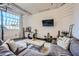 Spacious living room with sectional sofa and large windows at 426 Marietta Nw St # 410, Atlanta, GA 30313