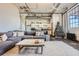 Open living area with exposed pipes and a Christmas tree at 426 Marietta Nw St # 410, Atlanta, GA 30313