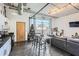Open living area featuring a gray sectional sofa and a Christmas tree at 426 Marietta Nw St # 410, Atlanta, GA 30313