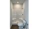 Bathroom with corner shower and modern toilet at 504 Overlook Rd, Covington, GA 30052