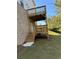 Elevated wooden deck with stairs at 504 Overlook Rd, Covington, GA 30052