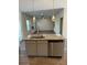 Kitchen island with granite countertop and stainless steel appliances at 504 Overlook Rd, Covington, GA 30052