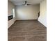 Spacious living room with fireplace and ceiling fan at 504 Overlook Rd, Covington, GA 30052