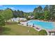 Resort-style pool with waterslide and area at 100 Lantana Dr, Locust Grove, GA 30248