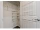 Spacious closet with built-in shelving for ample storage at 300 Johnson Ferry Rd # B905, Sandy Springs, GA 30328