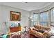 Cozy living room with hardwood floors, bay window, and comfortable seating at 3920 Charlemagne Sw Way, Marietta, GA 30064