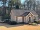 Community clubhouse with a charming exterior and landscaping at 1025 Charleston Trce, Roswell, GA 30075