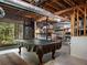 Basement recreation area featuring a pool table and access to backyard at 20 Pointe Se Ter, Atlanta, GA 30339