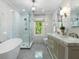 Luxurious bathroom with marble finishes and double vanity at 20 Pointe Se Ter, Atlanta, GA 30339