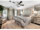 Spacious bedroom with a comfortable bed and sitting area at 20 Pointe Se Ter, Atlanta, GA 30339