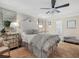 Bright bedroom with a queen-size bed and ensuite bathroom at 20 Pointe Se Ter, Atlanta, GA 30339