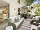 Spacious deck with comfortable seating and dining area, overlooking backyard at 20 Pointe Se Ter, Atlanta, GA 30339