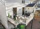 Spacious deck with seating area, outdoor dining, and partial view of backyard at 20 Pointe Se Ter, Atlanta, GA 30339