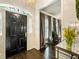 Elegant entryway with black door and hardwood floors at 20 Pointe Se Ter, Atlanta, GA 30339