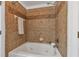 Bathroom with shower/tub combo and brown tile surround at 220 Semel Nw Cir # 170, Atlanta, GA 30309