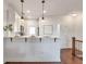 Kitchen island with white quartz countertop and black metal accents at 220 Semel Nw Cir # 170, Atlanta, GA 30309