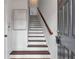 Modern staircase with dark wood treads and white risers at 220 Semel Nw Cir # 170, Atlanta, GA 30309