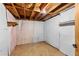 Unfinished basement area with concrete flooring and exposed ceiling at 2574 Regal Cir, Lawrenceville, GA 30044