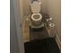 Small bathroom with toilet and flooring at 2013 Chesley Dr, Austell, GA 30106