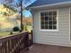 Deck view of home's exterior and a portion of the backyard at 5880 Yardley Ct, Powder Springs, GA 30127