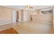 Tile floor dining area with adjacent half-bathroom and kitchen at 6422 Phillips Ct, Lithonia, GA 30058