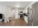 Modern kitchen with stainless steel appliances and white cabinets at 9012 Hurst Ct, Jonesboro, GA 30238