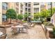 Relaxing courtyard with seating, grill, and fountain at 390 17Th Nw St # 4003, Atlanta, GA 30363