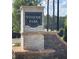 Winsome Park community entrance sign with brick pillars at 273 Dahlia Dr, Woodstock, GA 30188