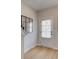 Bright entryway with light hardwood floors and a white door at 3304 Cranston Ln, Kennesaw, GA 30144