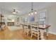 Farmhouse dining room with hardwood floors and large windows at 335 Brook Dr, Atlanta, GA 30328