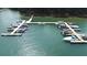 Aerial view of community boat docks on a lake at 3200 Rim Cove Dr # 186, Cumming, GA 30041