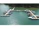 Aerial view of community boat docks on a lake at 3200 Rim Cove Dr # 186, Cumming, GA 30041