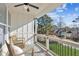 Relaxing balcony with wooded views and neighborhood view at 108 Cottage Gate Ln, Roswell, GA 30076