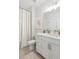 Bathroom with white vanity, bathtub, and shower at 108 Cottage Gate Ln, Roswell, GA 30076
