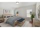 Bright bedroom with wood floors and large windows at 108 Cottage Gate Ln, Roswell, GA 30076
