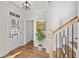 Bright and spacious entryway with hardwood floors and staircase at 108 Cottage Gate Ln, Roswell, GA 30076