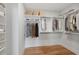 Large walk-in closet with shelving and hanging rods at 108 Cottage Gate Ln, Roswell, GA 30076