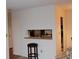 Breakfast bar pass-through to kitchen with bar stool at 300 Johnson Ferry Rd # B802, Atlanta, GA 30328