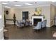 Common area or lounge with fireplace, seating, and holiday decor at 300 Johnson Ferry Rd # B802, Atlanta, GA 30328