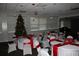 Community room with round tables, decorated for the holidays at 300 Johnson Ferry Rd # B802, Atlanta, GA 30328