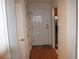 Entryway or foyer with white door, hardwood floors at 300 Johnson Ferry Rd # B802, Atlanta, GA 30328