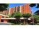 Brick apartment building with landscaped grounds and ample parking at 300 Johnson Ferry Rd # B802, Atlanta, GA 30328