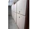 Storage units in a corridor, each with a lock and number at 300 Johnson Ferry Rd # B802, Atlanta, GA 30328