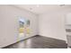 Bright dining area with patio access and hardwood floors at 8598 Secretariat Dr, Lithonia, GA 30058