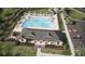 Community pool with clubhouse, lounge chairs, and ample parking at 8598 Secretariat Dr, Lithonia, GA 30058