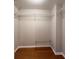 Spacious walk-in closet with wire shelving and wood flooring at 199 14Th Ne St # 1609, Atlanta, GA 30309