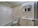 Clean bathroom with a shower/tub combo and white vanity at 1081 Bridgemill Ave, Canton, GA 30114